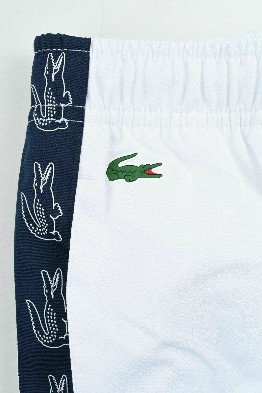 LACOSTE Boys' Girls' White & Blue Logo Side Tape Track Pants Joggers, 8 years