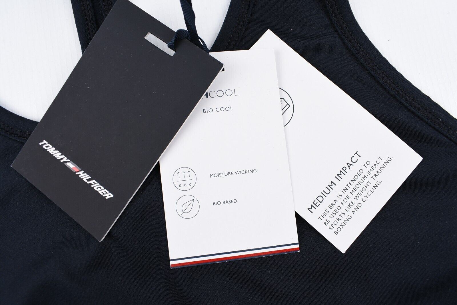 TOMMY HILFIGER Women's Mid Intensity Racerback Sports Bra, Blue, size S (UK 10)