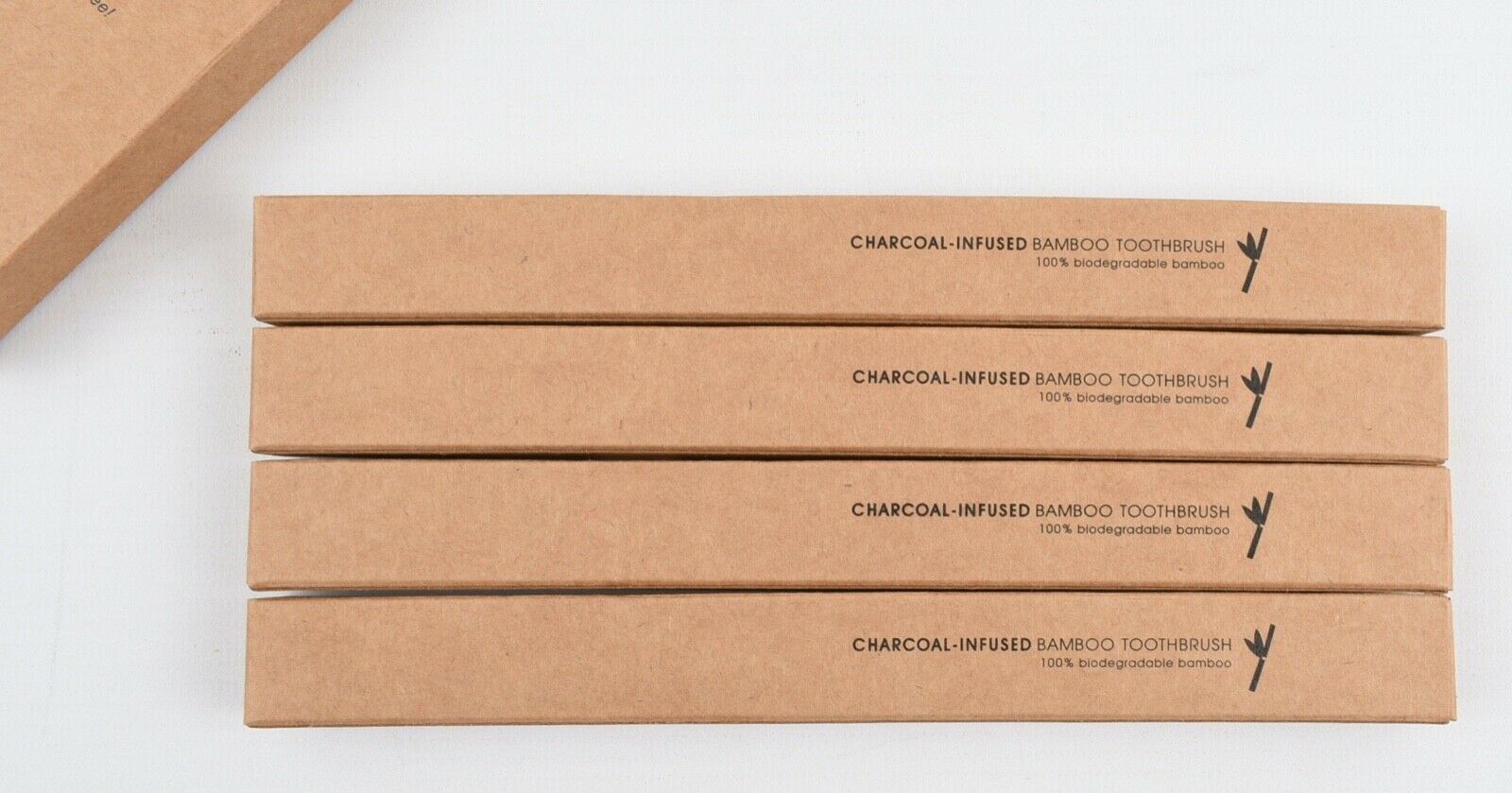 JOB LOT of 14 x 4-pack Eco Friendly Charcoal-Infused Bamboo Toothbrushes