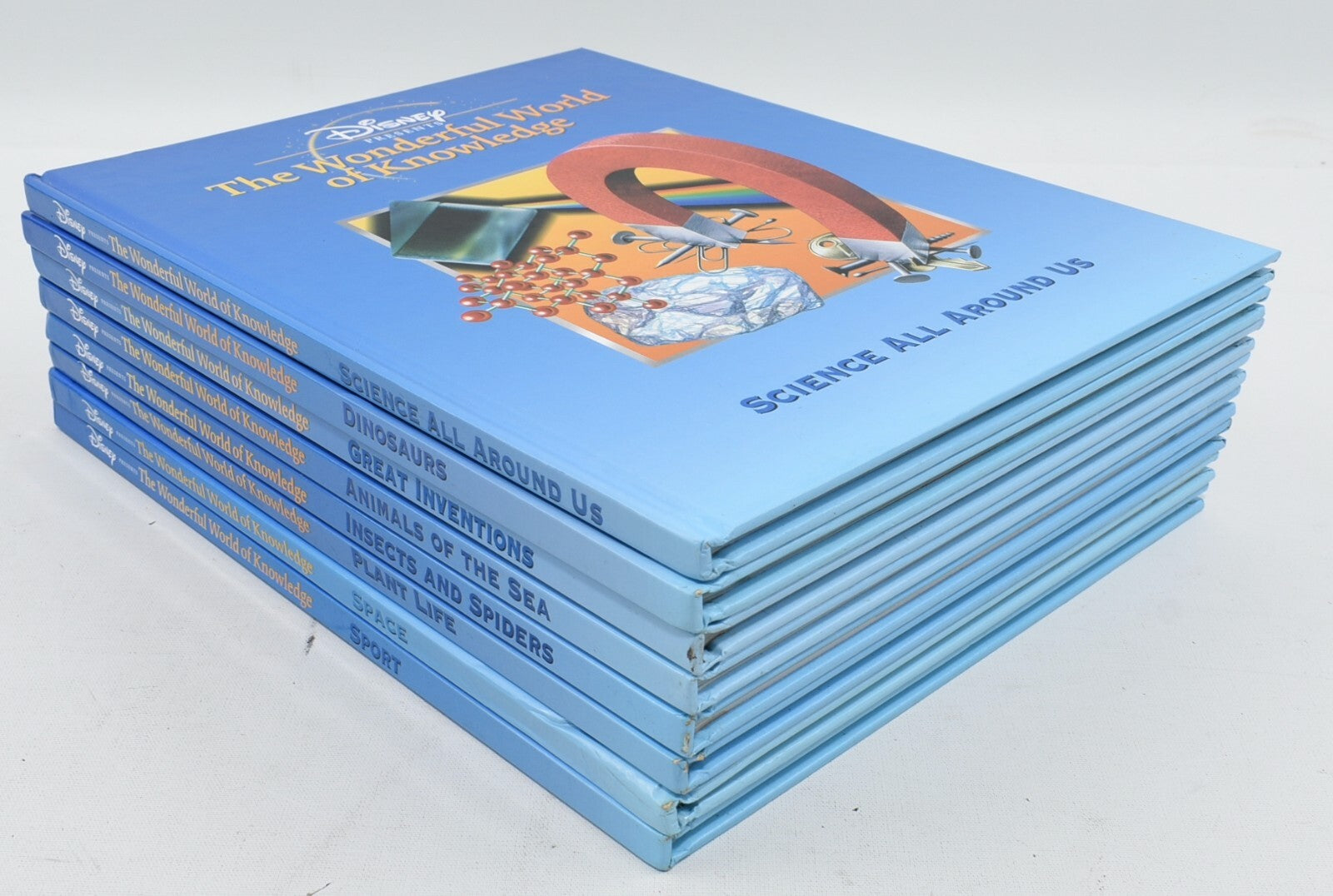 Disney presents THE WONDERFUL WORLD OF KNOWLEDGE - Set of 8 Books (1999)